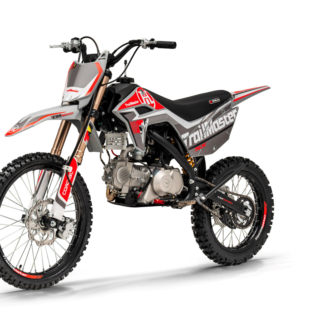 Trailmaster SX125 Dirt Bike, 4 speed manual trans, Air Cooled, Stainless Exhaust, Electric Start, 19 inch front tire, 32.70 inch seat height, Water Proof Wiring Harness