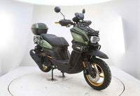 Vitacci Tank Pro X200 (carb).  13 inch rims, Blue Tooth, USB Charger, Electric Start, Locking Trunk, 13 inch rims, Dual Sport Tires, Flat deck Style floor, 31.5 Inch seat Height, Dual Disc Brakes