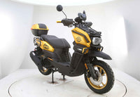 Vitacci Tank Pro X200 (carb).  13 inch rims, Blue Tooth, USB Charger, Electric Start, Locking Trunk, 13 inch rims, Dual Sport Tires, Flat deck Style floor, 31.5 Inch seat Height, Dual Disc Brakes