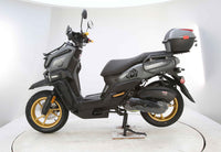 Vitacci Tank Pro X200 (carb).  13 inch rims, Blue Tooth, USB Charger, Electric Start, Locking Trunk, 13 inch rims, Dual Sport Tires, Flat deck Style floor, 31.5 Inch seat Height, Dual Disc Brakes