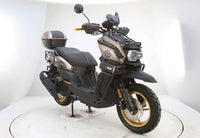Vitacci Tank Pro X200 (carb).  13 inch rims, Blue Tooth, USB Charger, Electric Start, Locking Trunk, 13 inch rims, Dual Sport Tires, Flat deck Style floor, 31.5 Inch seat Height, Dual Disc Brakes