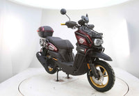 Vitacci Tank Pro X200 (carb).  13 inch rims, Blue Tooth, USB Charger, Electric Start, Locking Trunk, 13 inch rims, Dual Sport Tires, Flat deck Style floor, 31.5 Inch seat Height, Dual Disc Brakes