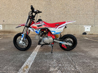 Trailmaster JHL PRO SK110S, Semi Automatic 4 speed, Electric Start, 12 inch front tire, Inverted Front Forks, 25 inch seat height,